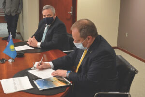 Valley Vice President and General Manager of International Irrigation Josh Dixon and Valmont President and CEO Steve Kaniewski participate in a virtual signing of the investment agreement.